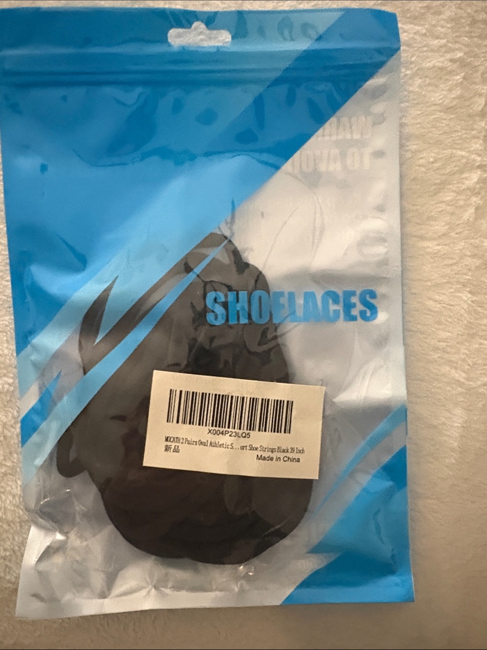 Black Shoelaces Pack with Bold Blue Packaging Text
